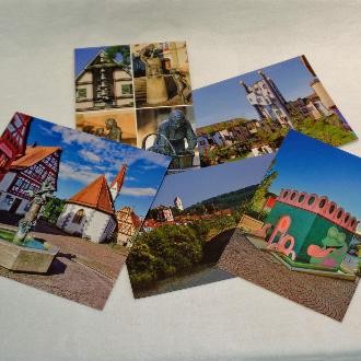 Zusammenstellung verschiedener Postkarten mit Plochinger Motiven, die in der PlochingenInfo erhältlich sind